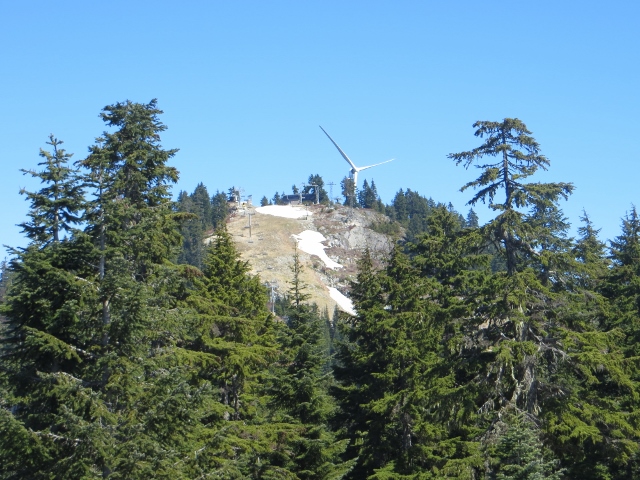 A wind turbine at the top of the 4,000ft Mount Grouse in Vancouver. The turbine provides a percentage of the city's power. In previous years, the mountain has been covered with approx. 12ft of snow and has been inaccessible until May. This year, it is already open to the public.
